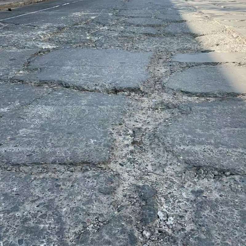 黄埔路面起砂露石子修补料